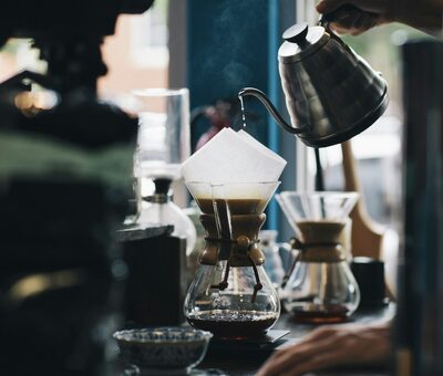 A barista pouring coffee